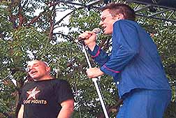 Nick Colby (left) joined pajama-clad Karl on stage during "Top of the World."